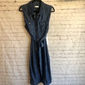 NWT Calvin Klein denim brass button down dress with front pockets. Size 8
